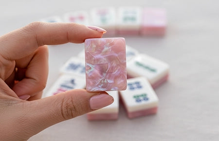 ALOXOO Mahjong Tile Held to Light - Mother-of-Pearl Back Detail